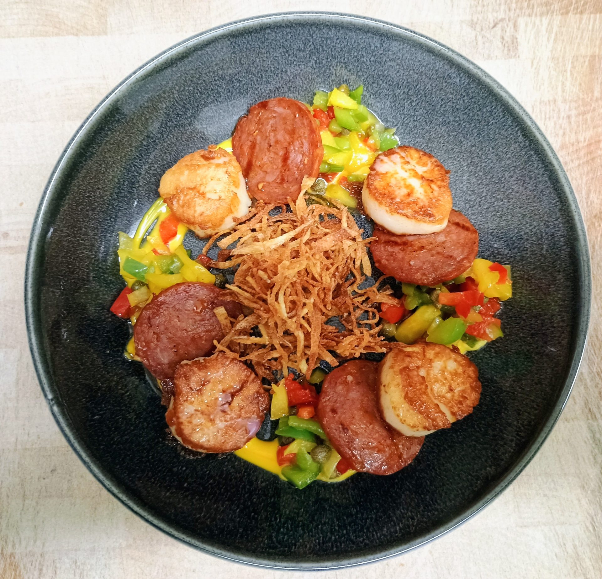 Seared scallops with chorizo and saffron aioli